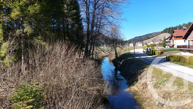 maison à vendre - 7 pièces - 119.7 m2 - LA CLUSE ET MIJOUX - 25 - FRANCHE-COMTE - Century 21 Avenir Immobilier