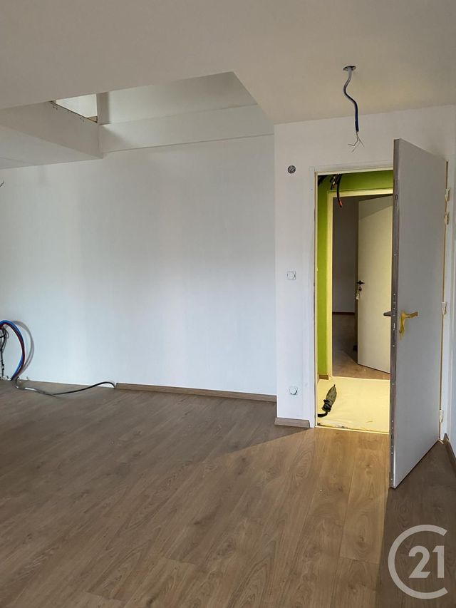 Appartement Duplex à louer - 3 pièces - 43.12 m2 - PONTARLIER - 25 - FRANCHE-COMTE - Century 21 Avenir Immobilier