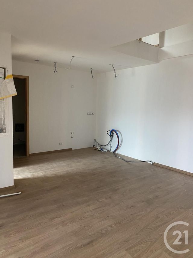 Appartement Duplex à louer - 3 pièces - 43.12 m2 - PONTARLIER - 25 - FRANCHE-COMTE - Century 21 Avenir Immobilier